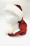 Red Velvet Santa hat with a fluffy white faux fur trim and large white pom-pom, displayed on a white mannequin head against a plain background.