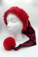 Red and black (buffalo) plaid Santa-style hat with a fluffy red faux fur brim and large red pom-pom, displayed on a white mannequin head.