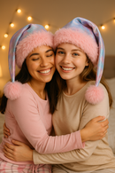 Sparkle at your pajama party with our shimmering pastel tie-dye hat! Handmade with fluffy pink trim & pom-pom for cozy, playful fun.