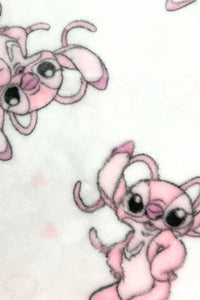 A close-up of a soft white fabric printed with Angel (girlfriend of Disney's character Stitch) a pink cartoon character that resemble a small creature with big eyes, long ears, and a playful expression. Some characters are standing with one arm raised, while others are upside down. Light pink heart outlines are scattered in the background.
