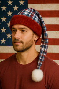 Adult wearing a handmade red, white, and blue plaid hat with stars, red faux-fur trim, and a white pom-pom, in a patriotic celebration setting.